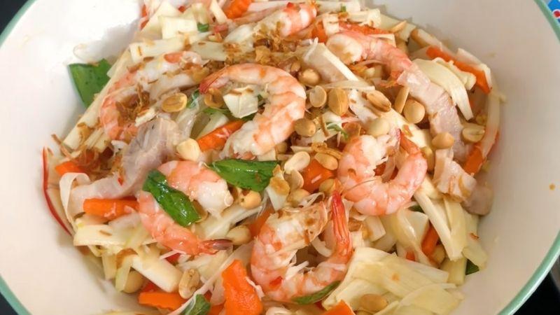 Thưởng thức món gỏi củ hủ dừa tôm thịt đậm đà hương vị miền Tây, chiêu đãi cả gia đình với một món ăn đặc sắc.