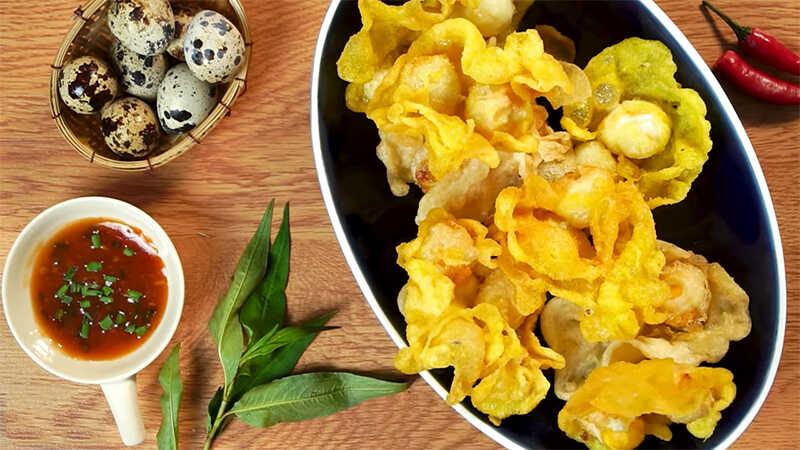Hướng dẫn cách chế biến trứng cút chiên giòn phủ sốt me chua ngọt, món ăn vặt không thể thiếu cho những tín đồ mê ăn vặt.