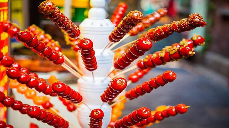 Kẹo hồ lô: Lịch sử, ý nghĩa văn hóa và cách tạo nên món ăn truyền thống độc đáo